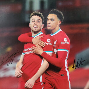 Double Signed Diogo Jota and Trent Alexander-Arnold A3 photo, signed by both players. A beautiful item to add to your collection of two Liverpool FC fan favourites.